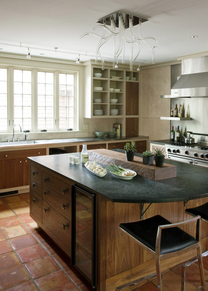 Mountain style kitchen photo in Boston with open cabinets and soapstone countertops