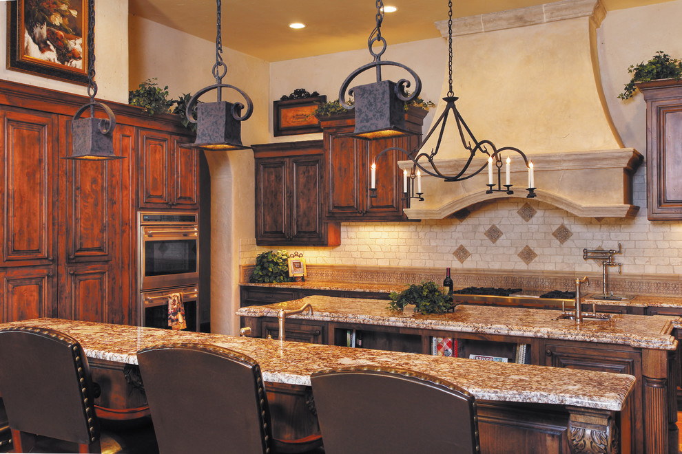 Tuscan kitchen photo in Austin with stainless steel appliances