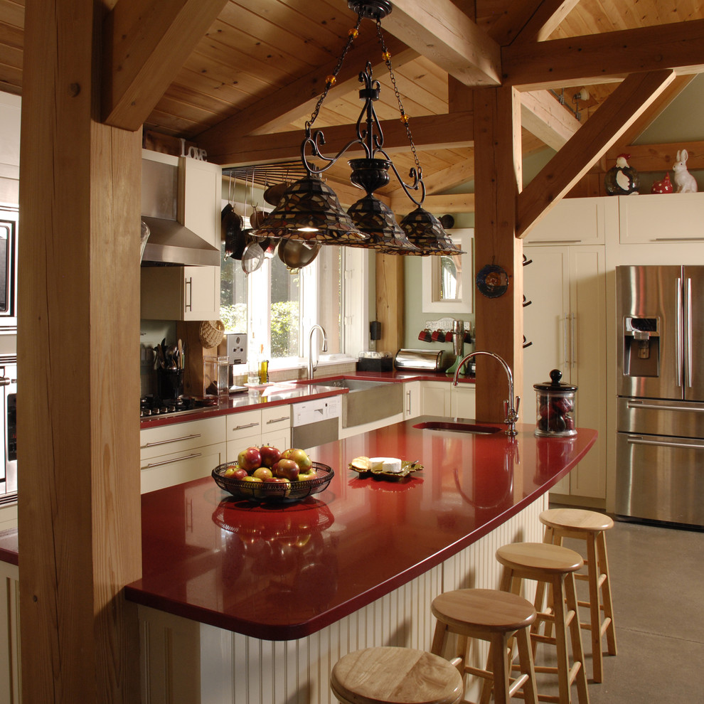 Foto di una cucina design con top rosso