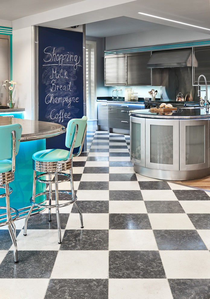 Inspiration for a midcentury kitchen in Wiltshire with limestone flooring.