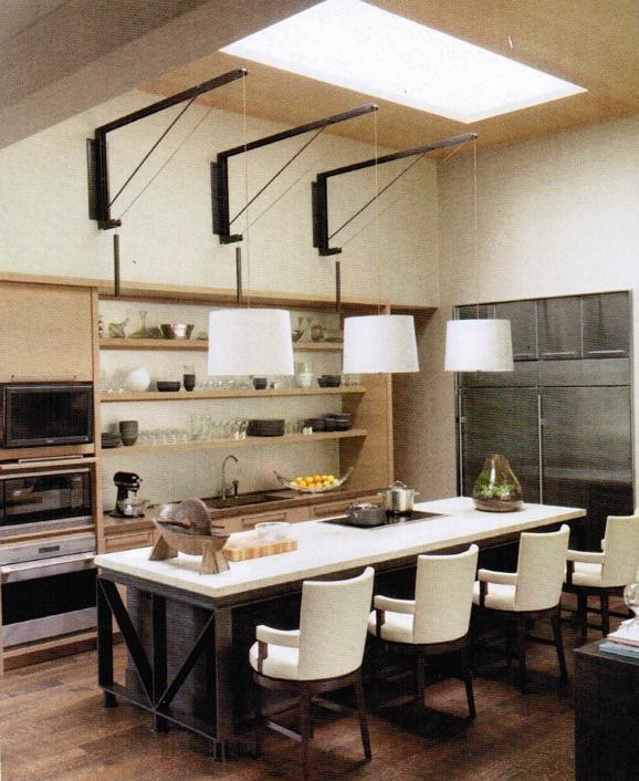 Esempio di una cucina moderna di medie dimensioni con lavello da incasso, nessun'anta, ante in legno chiaro, elettrodomestici in acciaio inossidabile e pavimento in legno massello medio