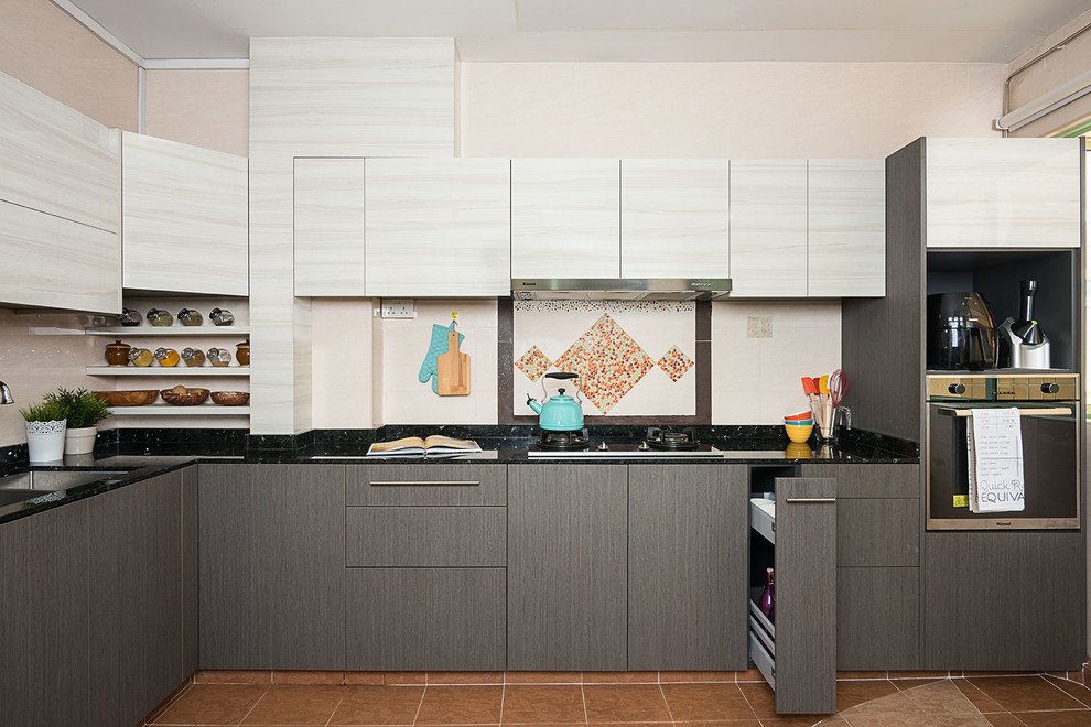 Example of a transitional kitchen design in Singapore