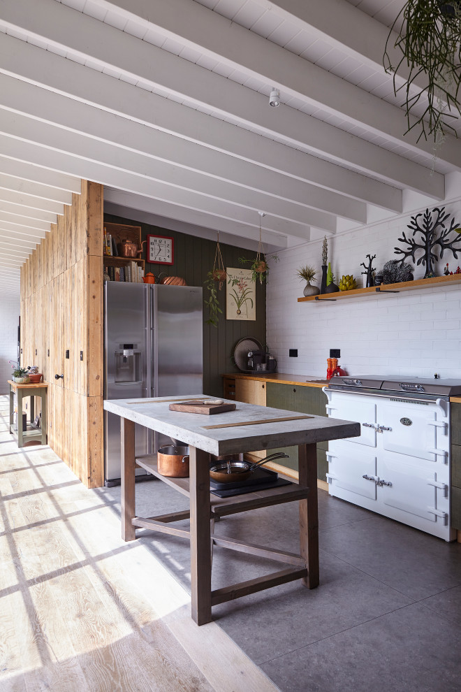 Design ideas for a farmhouse kitchen in Other with green cabinets, white splashback, metro tiled splashback, white appliances, an island, grey floors, exposed beams, a timber clad ceiling and a vaulted ceiling.
