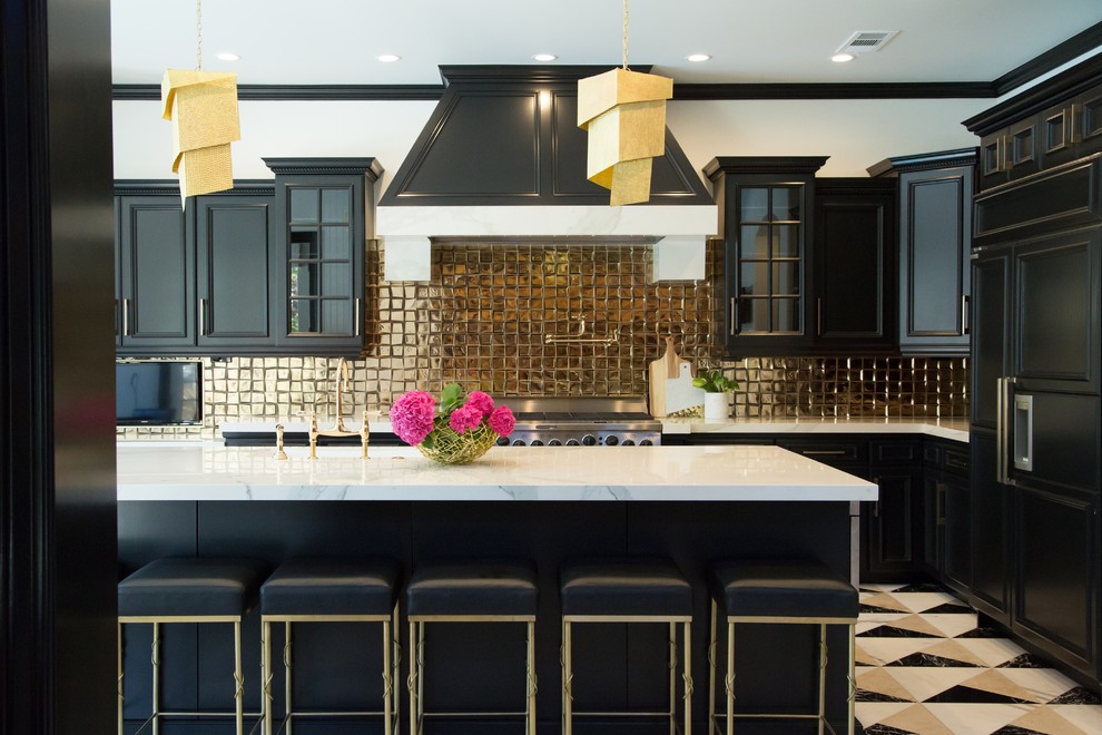 Example of a mid-sized trendy l-shaped marble floor and multicolored floor eat-in kitchen design in Other with an undermount sink, black cabinets, marble countertops, glass tile backsplash, metallic backsplash, stainless steel appliances, an island, recessed-panel cabinets and white countertops