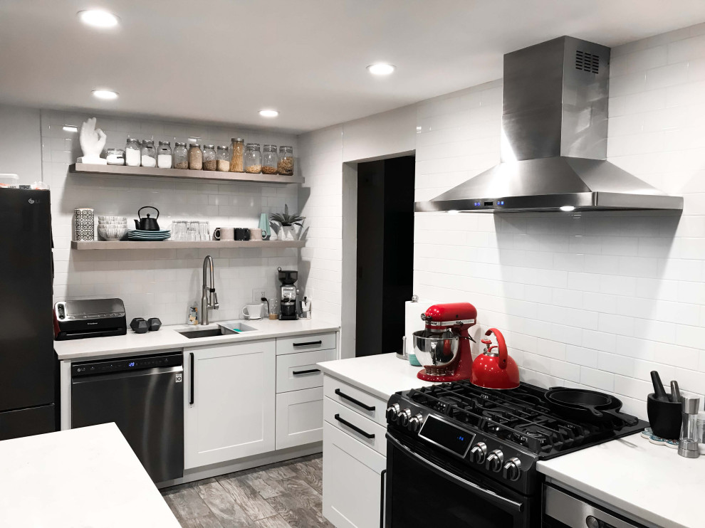Eat-in kitchen - mid-sized modern l-shaped cement tile floor and gray floor eat-in kitchen idea with a single-bowl sink, open cabinets, stainless steel cabinets, marble countertops, white backsplash, ceramic backsplash, stainless steel appliances, an island and white countertops