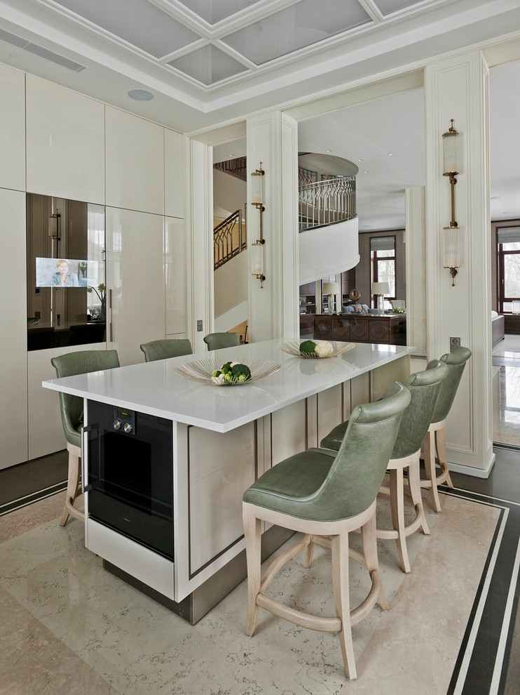 Foto de cocina clásica renovada con armarios con paneles lisos, puertas de armario blancas, electrodomésticos negros y una isla