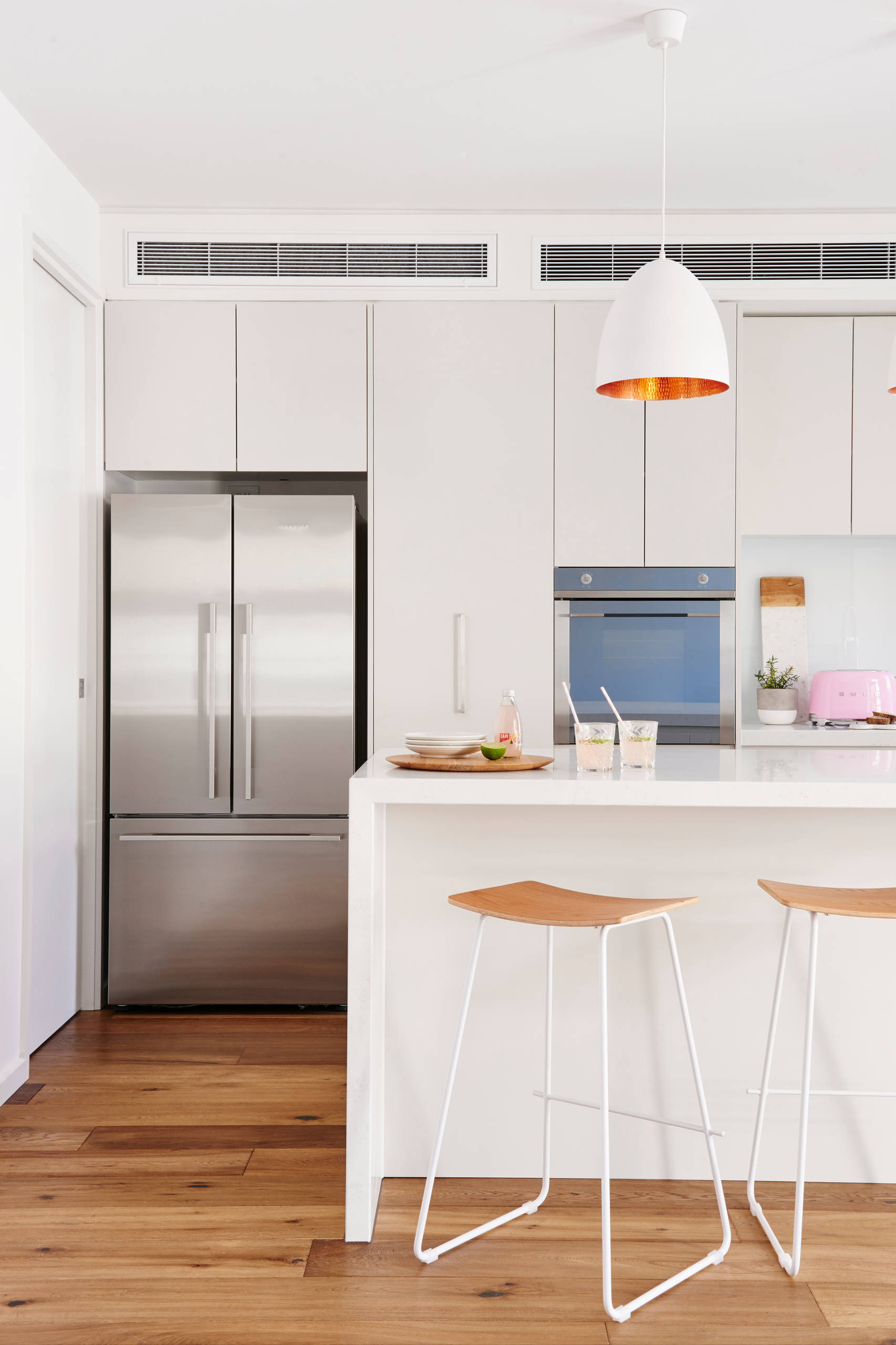 Warm Minimalist Kitchen Cabinets in Beige and Wood