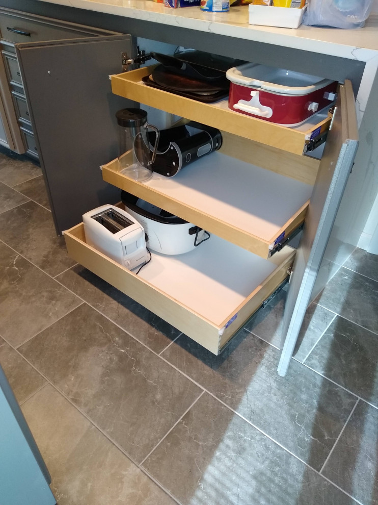Pull outs shelves make pantry more useful Contemporary Kitchen