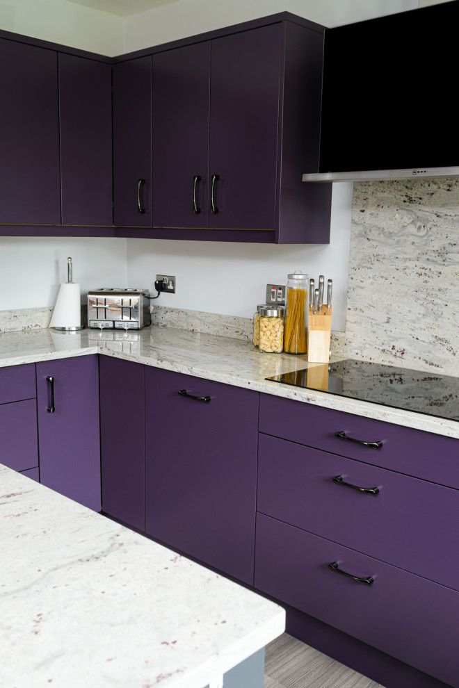 Large eclectic kitchen/diner in Other with flat-panel cabinets, purple cabinets, granite worktops and an island.