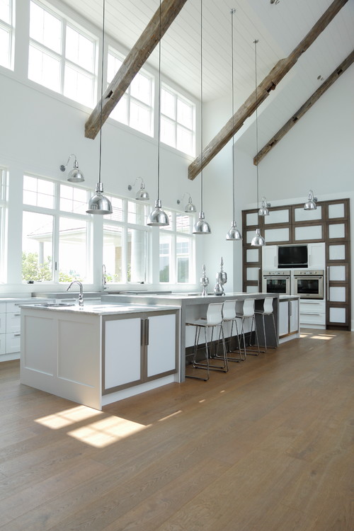 High Ceiling Farmhouse White Cabinets with Concrete Countertop