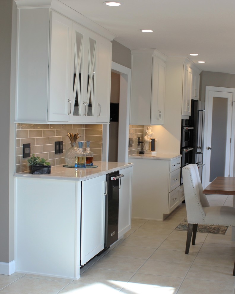 Quad Cities Kitchen With Gray Base and Waterfall Counters