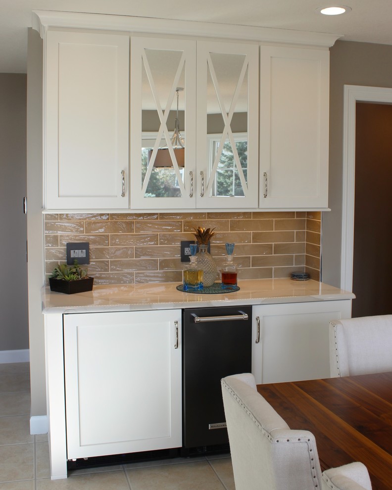 Example of a large transitional u-shaped ceramic tile and beige floor open concept kitchen design in Other with a farmhouse sink, flat-panel cabinets, gray cabinets, quartz countertops, beige backsplash, ceramic backsplash, stainless steel appliances, an island and white countertops