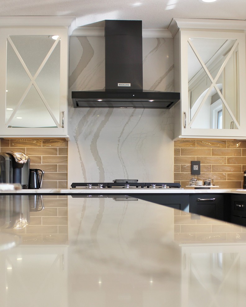 Quad Cities Kitchen With Gray Base and Waterfall Counters