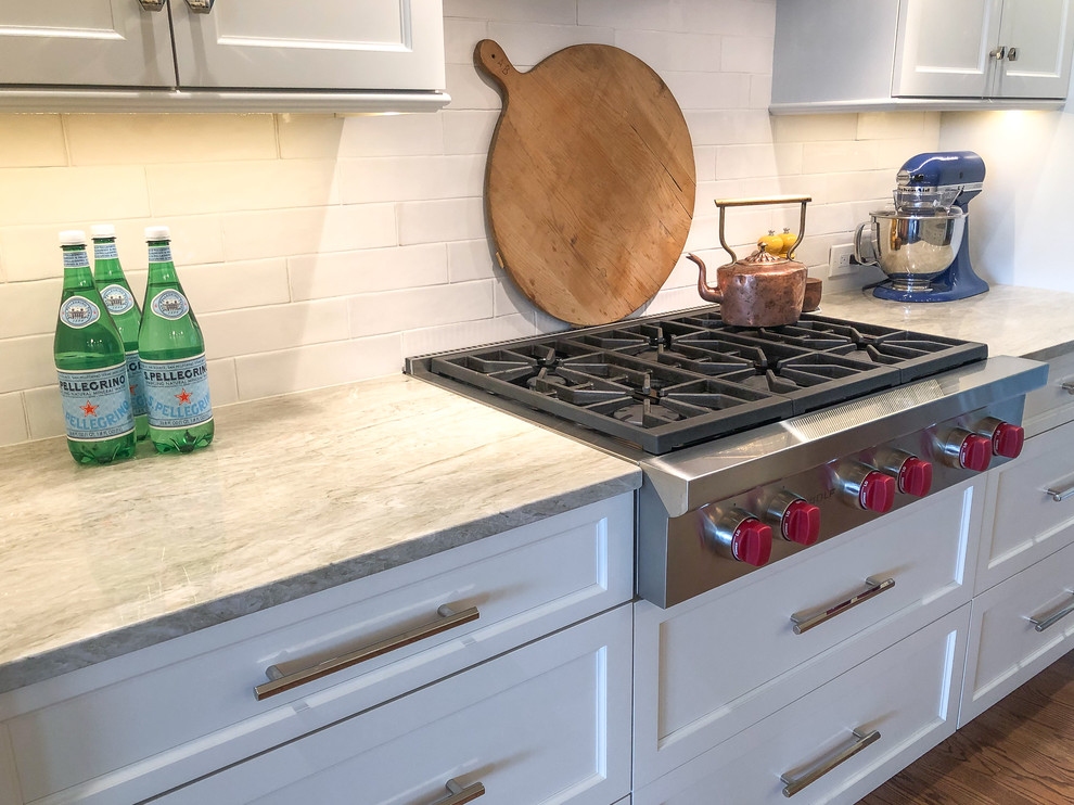 Example of a transitional kitchen design in Other with quartzite countertops and gray countertops