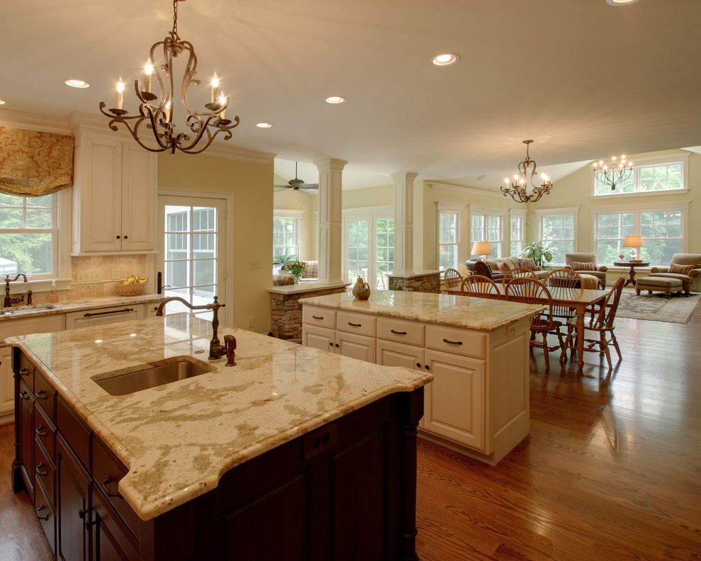 Open concept kitchen - traditional open concept kitchen idea in Columbus with granite countertops