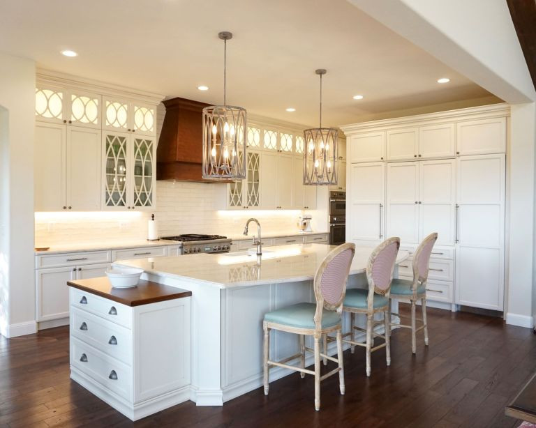 Inspiration for a huge timeless l-shaped open concept kitchen remodel in Denver with a farmhouse sink, shaker cabinets, white cabinets, quartzite countertops, white backsplash, subway tile backsplash, paneled appliances, an island and white countertops