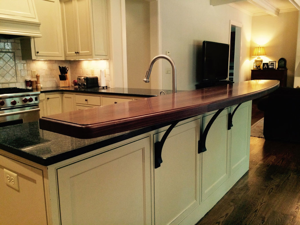 kitchen counter with raised steel bar