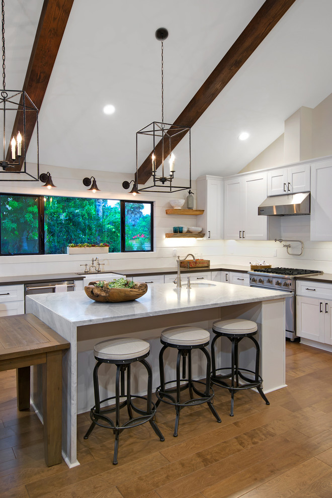 This is an example of a rustic kitchen in San Diego.