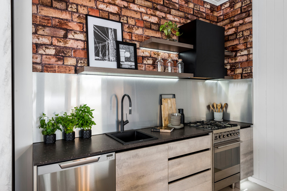 Inspiration for a small urban single-wall kitchen in Brisbane with a built-in sink, flat-panel cabinets, grey cabinets, engineered stone countertops, grey splashback, stainless steel appliances and no island.