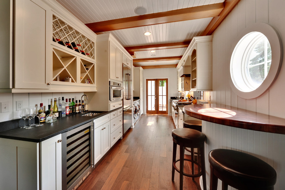Example of a classic kitchen design in Philadelphia with stainless steel appliances