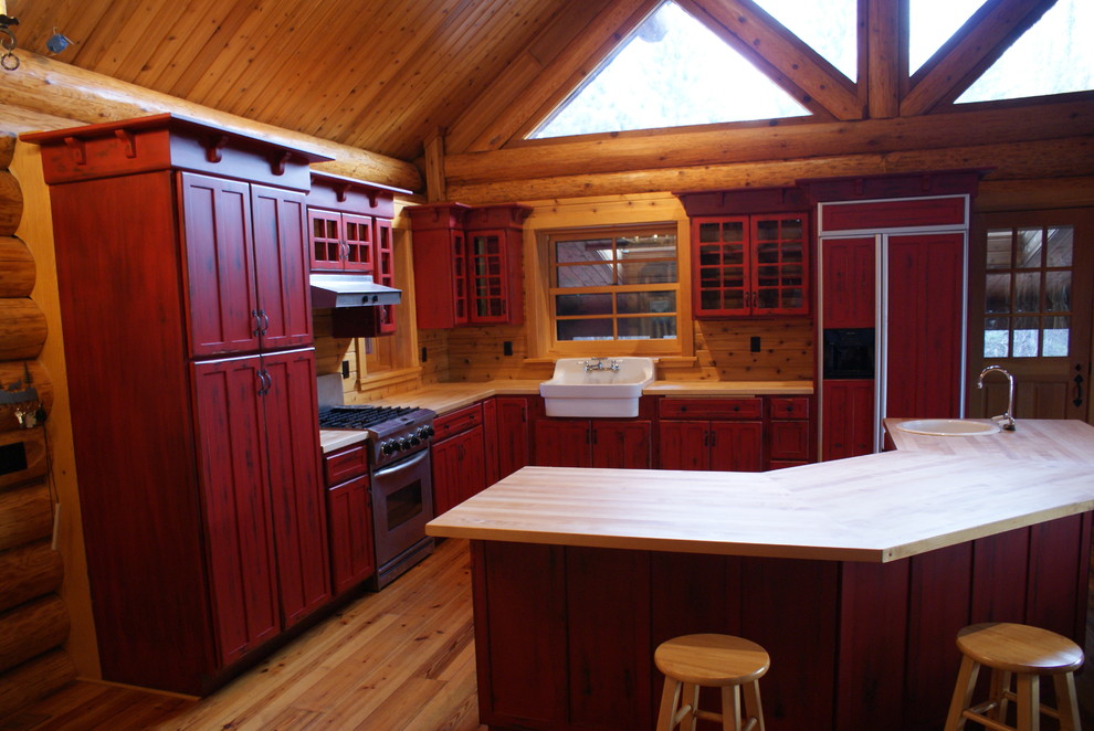Red distressed kitchen Rustic Kitchen Other by Northshore Wood Products INC