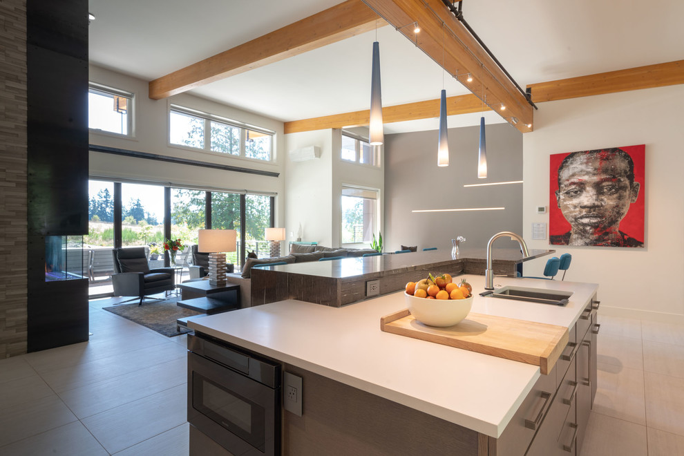 Inspiration for a contemporary l-shaped porcelain tile and white floor open concept kitchen remodel in Seattle with an undermount sink, flat-panel cabinets, quartzite countertops, blue backsplash, porcelain backsplash, stainless steel appliances, an island and white countertops