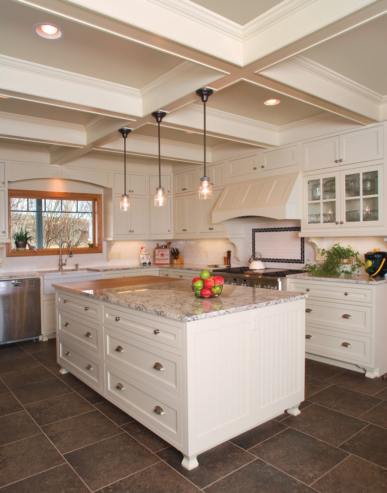 Inspiration for a country kitchen in Other with shaker cabinets, white cabinets and stainless steel appliances.