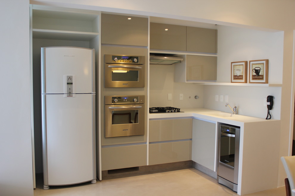 Trendy kitchen photo in Other with stainless steel appliances
