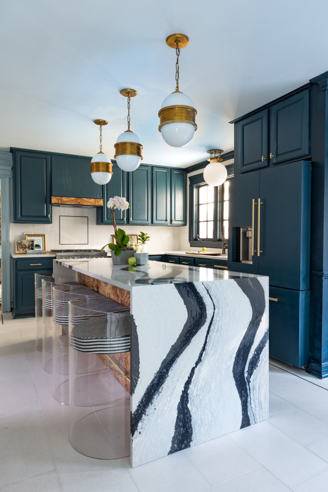 Example of a large trendy l-shaped porcelain tile and white floor kitchen design in DC Metro with raised-panel cabinets, blue cabinets, white backsplash, an island and white countertops