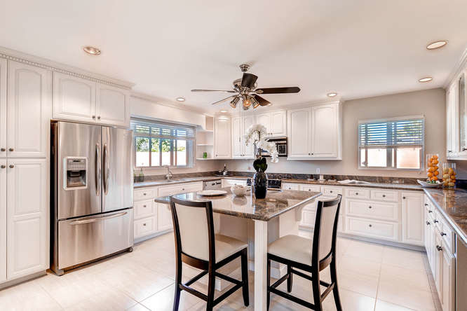 Example of a mid-sized transitional kitchen design in Phoenix
