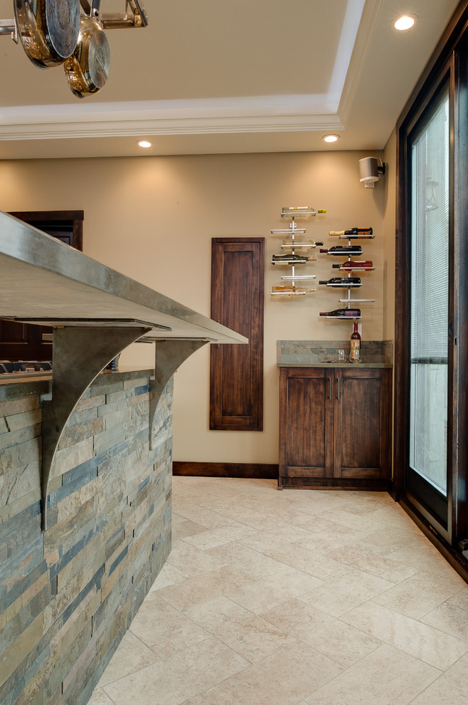 Eat-in kitchen - mid-sized transitional l-shaped travertine floor eat-in kitchen idea in Other with an undermount sink, recessed-panel cabinets, dark wood cabinets, quartz countertops, multicolored backsplash, stone slab backsplash, stainless steel appliances and an island