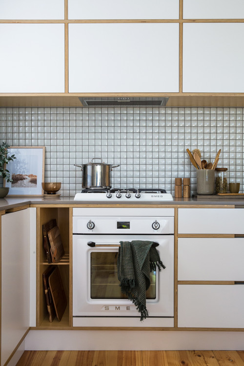 Wood Details and Gray Countertop in White Flat-Panel Cabinets - Combining Elegance with Retro Kitchen Backsplash Ideas