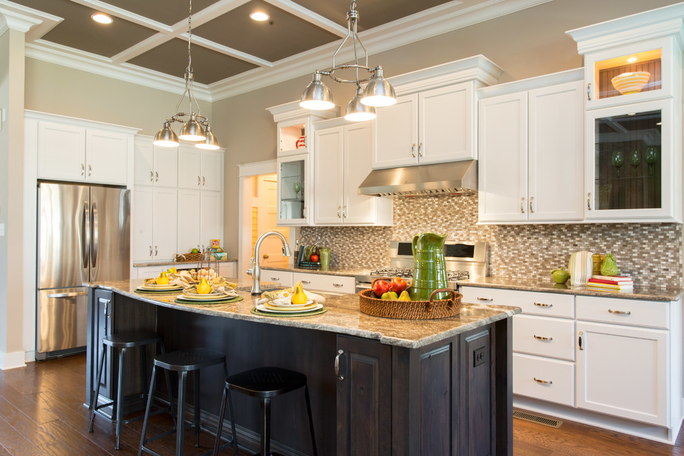 Example of a mid-sized eclectic l-shaped medium tone wood floor eat-in kitchen design in Richmond with a farmhouse sink, recessed-panel cabinets, white cabinets, granite countertops, multicolored backsplash, glass tile backsplash, stainless steel appliances and an island