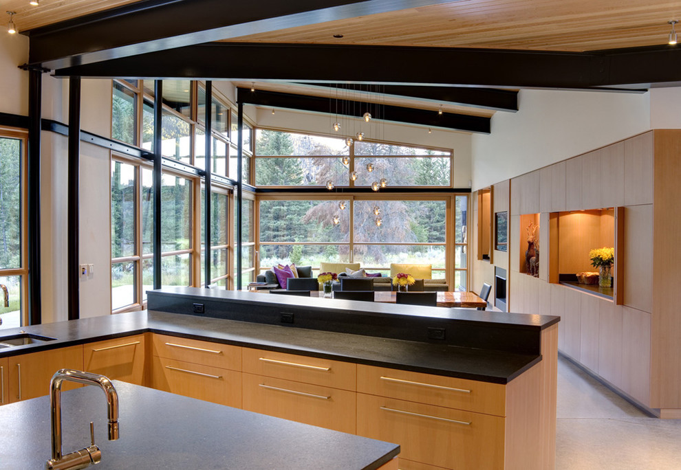Inspiration for a contemporary eat-in kitchen remodel in Seattle with flat-panel cabinets and light wood cabinets