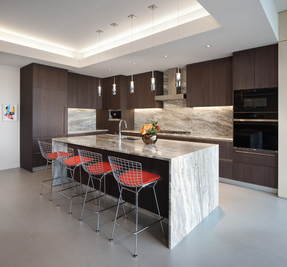 This is an example of a medium sized contemporary l-shaped kitchen in Chicago with flat-panel cabinets, an island, a submerged sink, dark wood cabinets, beige splashback, black appliances and grey floors.