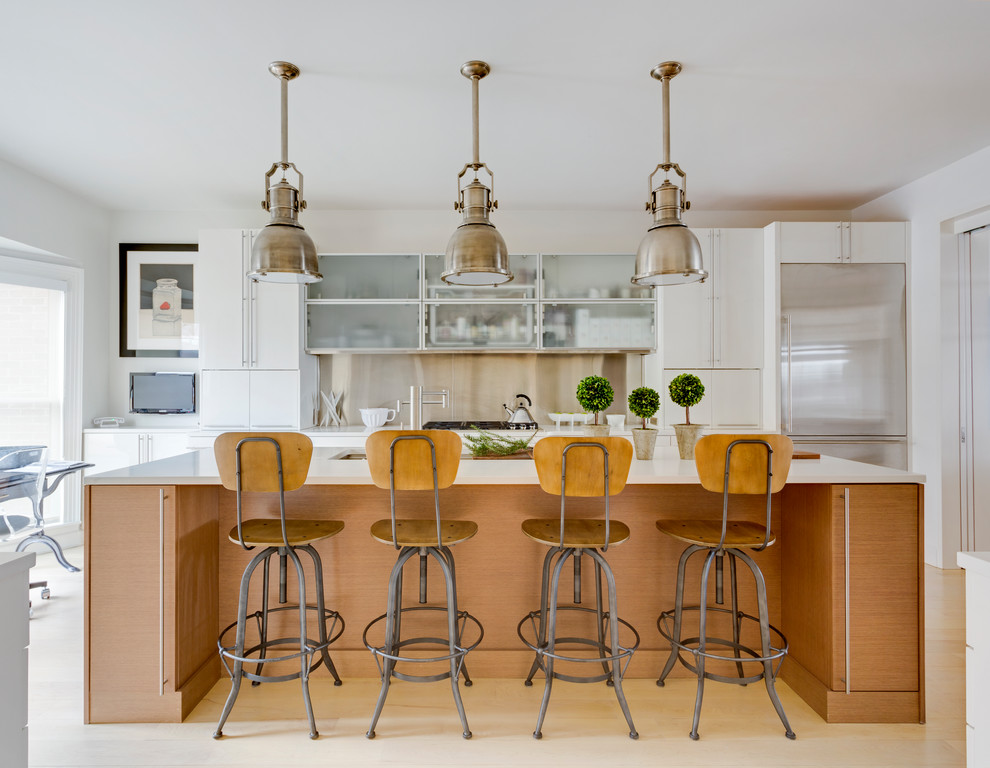 Mid-sized minimalist galley light wood floor and beige floor eat-in kitchen photo in Chicago with an undermount sink, flat-panel cabinets, white cabinets, metal backsplash, stainless steel appliances, an island, white countertops and quartz countertops
