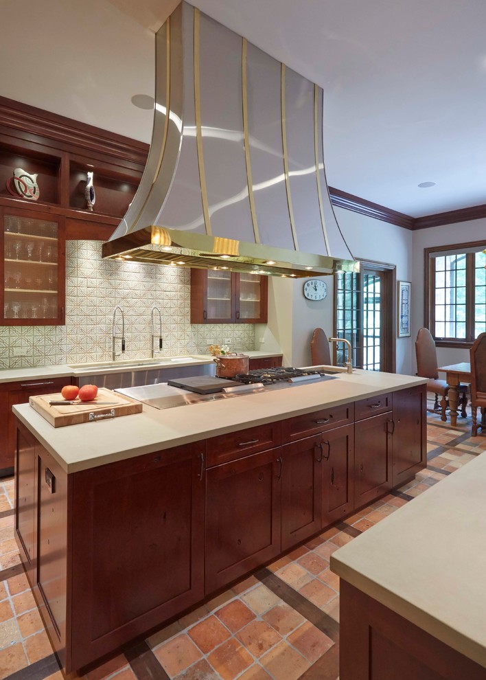 Design ideas for an expansive classic galley kitchen/diner in Chicago with a submerged sink, shaker cabinets, dark wood cabinets, soapstone worktops, white splashback, ceramic splashback, stainless steel appliances, terracotta flooring and multiple islands.