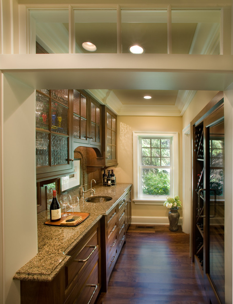 Inspiration for a timeless kitchen remodel in Minneapolis with glass-front cabinets