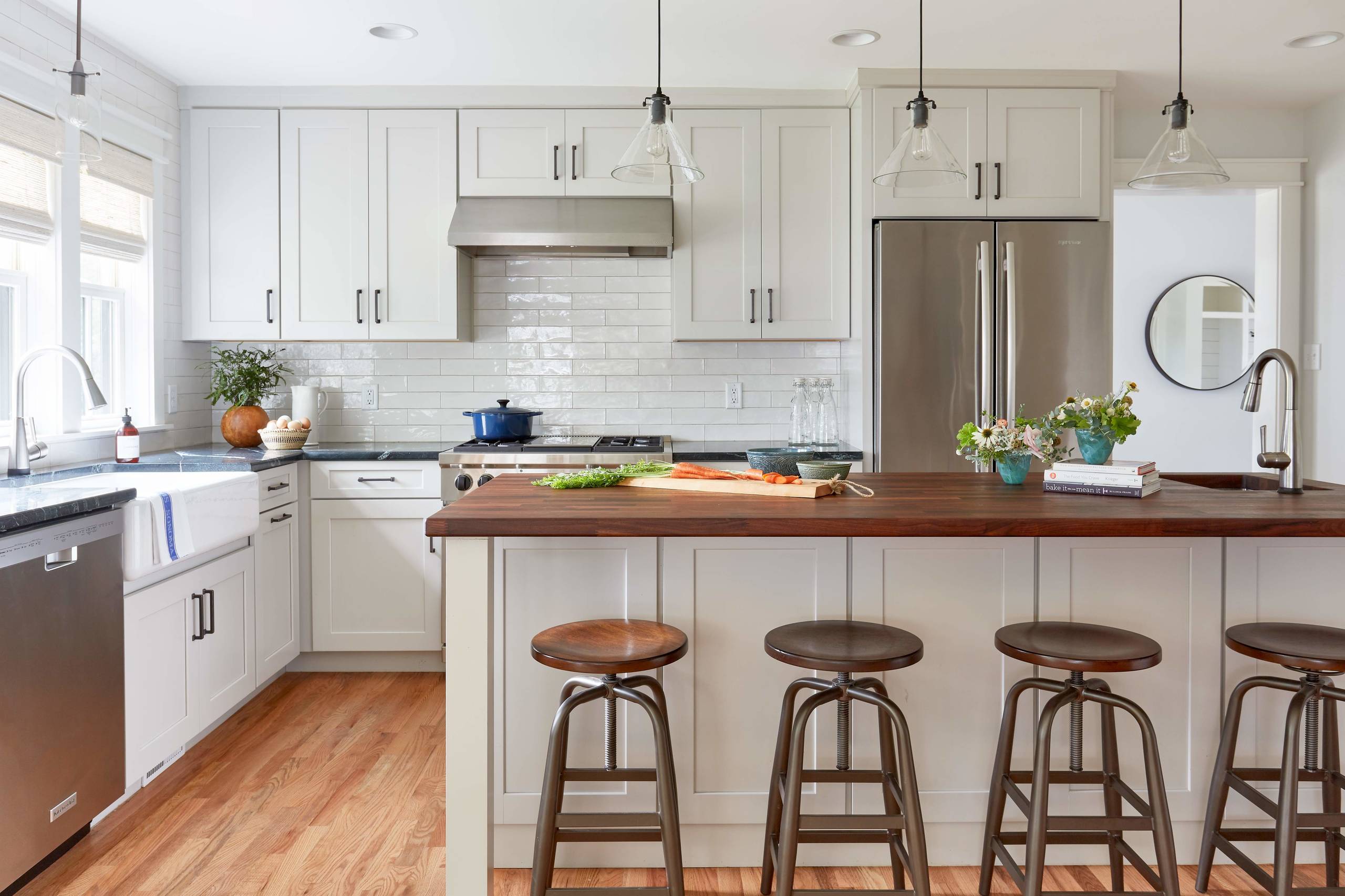 75 kitchen with wood countertops and stainless steel appliances