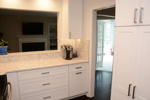 Rockville, MD All White Quartz Condo Kitchen Countertops - Transitional