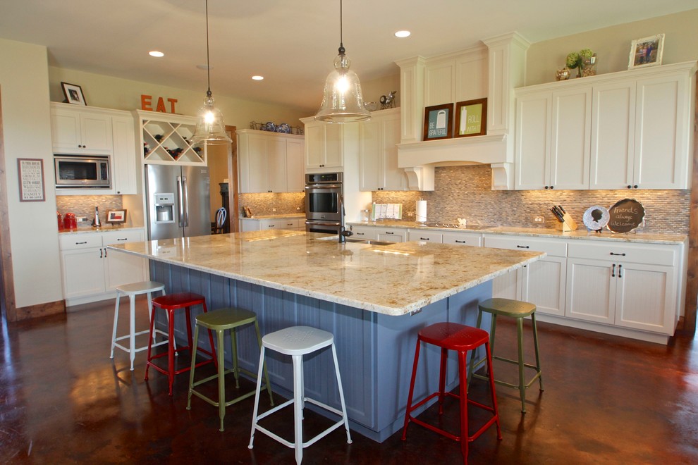 Example of a classic l-shaped open concept kitchen design in Dallas with an undermount sink, shaker cabinets, white cabinets, granite countertops, multicolored backsplash, mosaic tile backsplash and stainless steel appliances