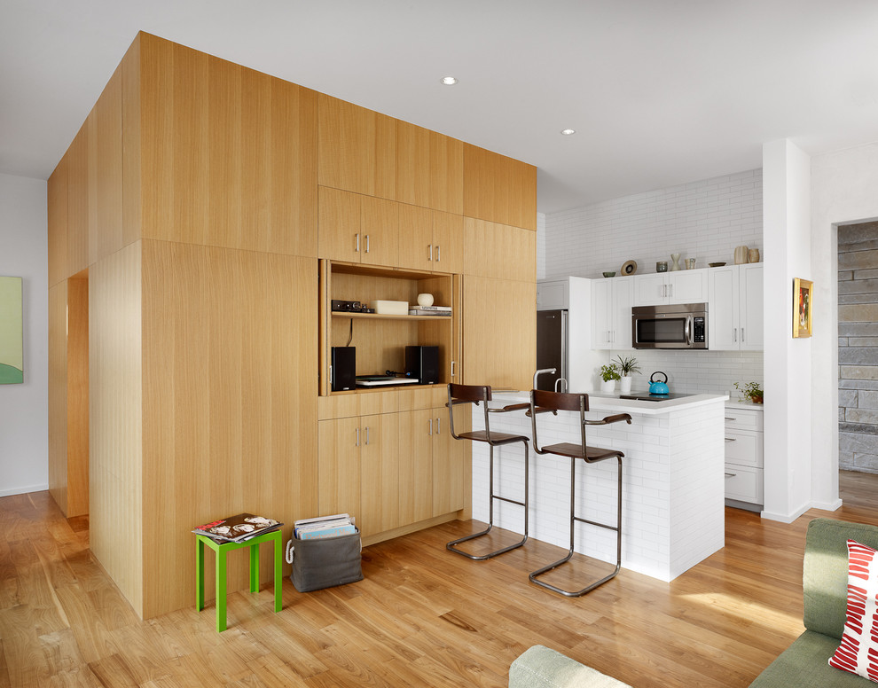 Photo of a contemporary kitchen in Austin with metro tiled splashback.