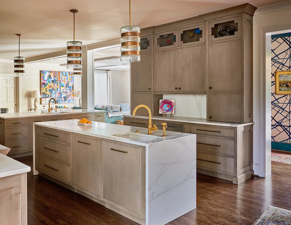 Eat-in kitchen - huge transitional u-shaped dark wood floor and brown floor eat-in kitchen idea in Other with an undermount sink, beaded inset cabinets, medium tone wood cabinets, quartzite countertops, white backsplash, marble backsplash, paneled appliances and two islands