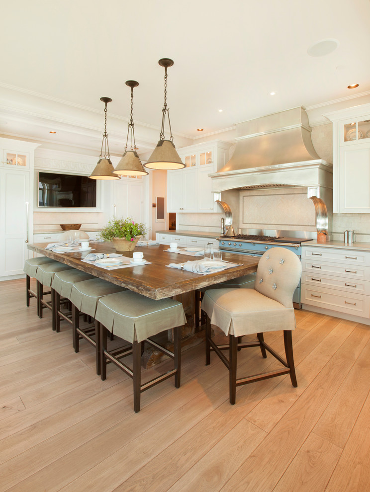 Kitchen - transitional kitchen idea in Omaha with recessed-panel cabinets, white cabinets and colored appliances