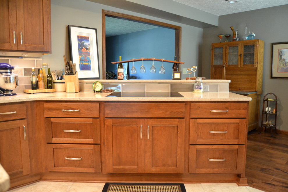 Example of a mid-sized transitional ceramic tile and beige floor kitchen design in Other with recessed-panel cabinets, white cabinets, terrazzo countertops, multicolored backsplash, porcelain backsplash, stainless steel appliances and an island
