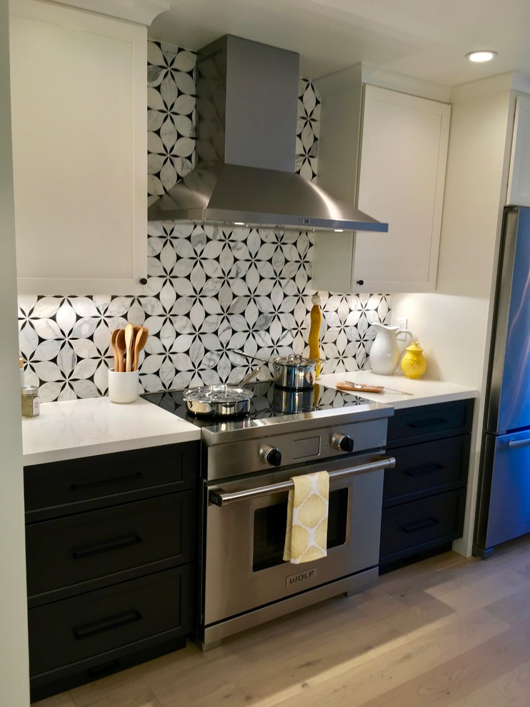 Small trendy galley beige floor eat-in kitchen photo in San Francisco with a single-bowl sink, shaker cabinets, white cabinets, quartz countertops, multicolored backsplash, marble backsplash, stainless steel appliances and a peninsula