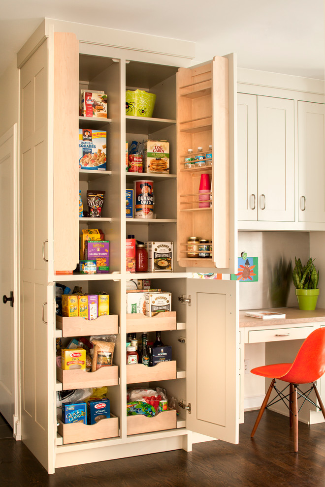 Eat-in kitchen - large transitional l-shaped dark wood floor eat-in kitchen idea in New York with an integrated sink, shaker cabinets, gray cabinets, limestone countertops, beige backsplash, mosaic tile backsplash, stainless steel appliances and an island