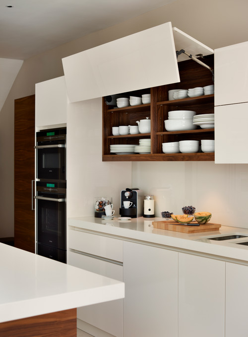 Kitchen Storage Cabinet Solutions in a Contemporary Kitchen with Bespoke White Cabinets