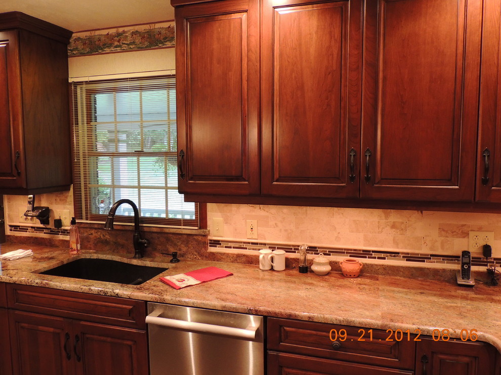 Example of a mid-sized classic kitchen design in Other