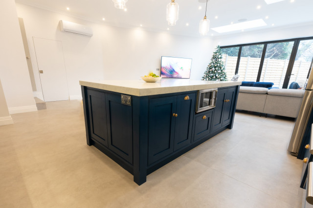 Royal Navy Blue Shaker Style Kitchen with integrated dining seating ...